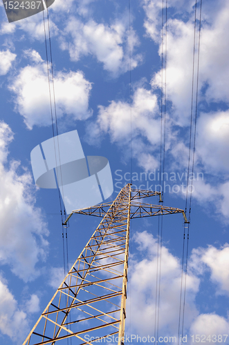 Image of High voltage electricity wires and poles. 