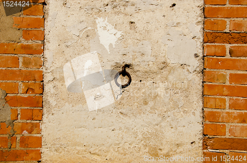 Image of Red brick and concrete wall. 