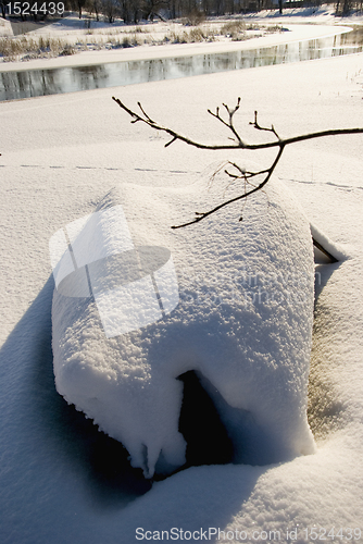 Image of Old wooden boats resting in winter.