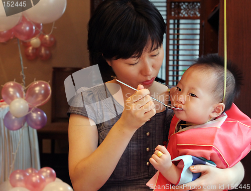 Image of Korean child with his mother