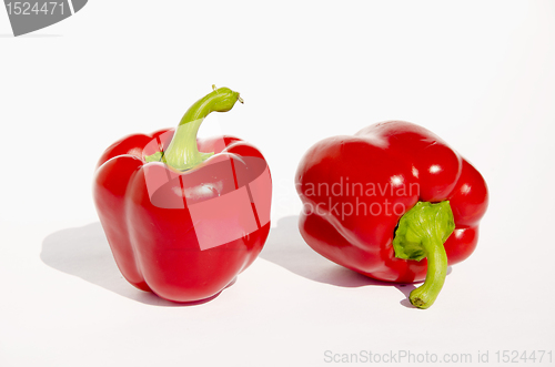 Image of Two red paprikas. Ecological food.