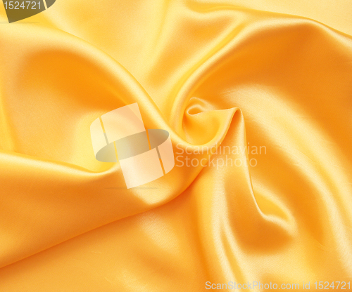 Image of Smooth elegant golden satin as background 