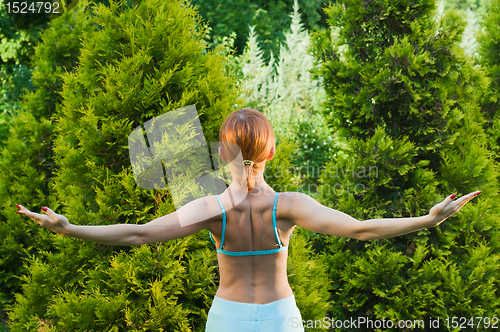 Image of Beautiful woman practicing fitness or yoga