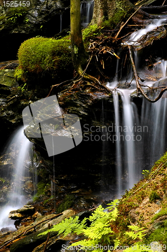 Image of small waterfalls in czech mountain