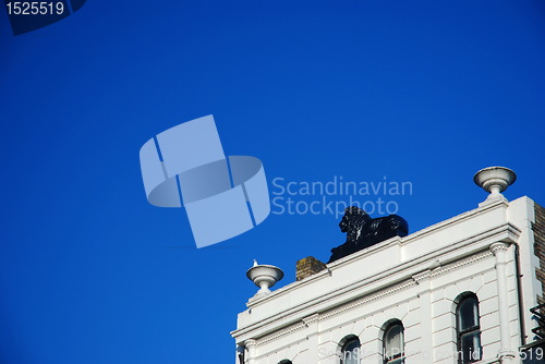 Image of White building and sculpture