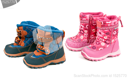Image of Two pairs of baby blue and pink boots