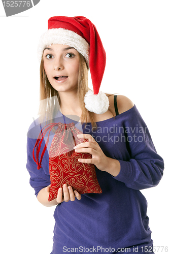 Image of Beautiful girl in red Santa hat