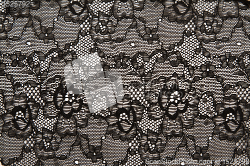 Image of Background from black lace with pattern with form flower