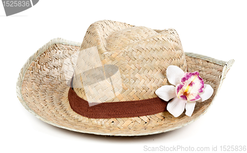 Image of straw hat with a flower orchid