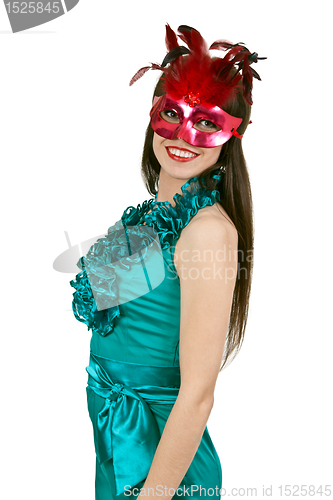 Image of brunette girl in a blue dress and mask
