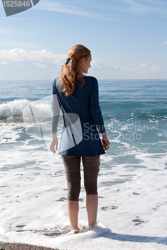 Image of The girl on the beach