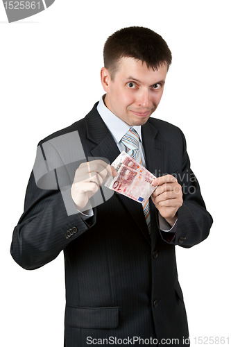 Image of Businessman shows the two bills by ten euros