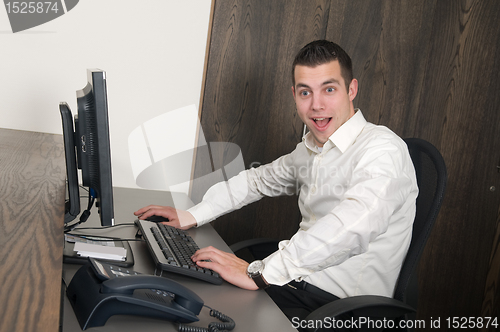 Image of Male worker at a helpdesk