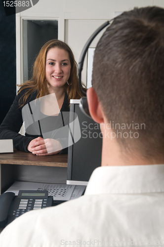 Image of Customer at a service desk
