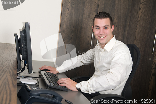 Image of Male worker at a helpdesk