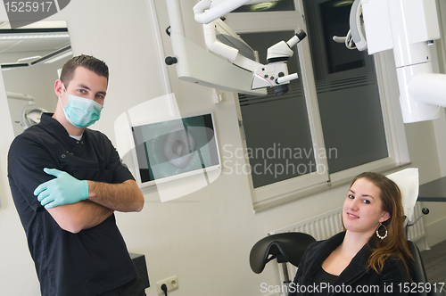 Image of Dentist and his patient