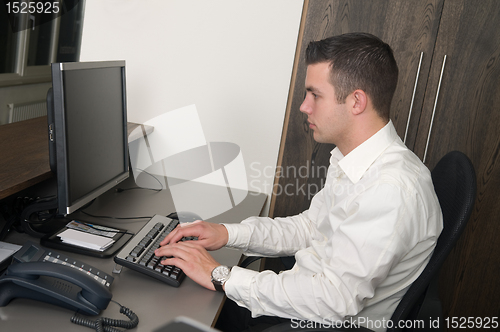 Image of Male worker at a helpdesk