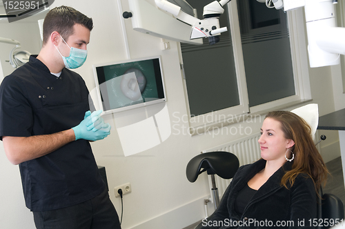 Image of Dentist and his patient