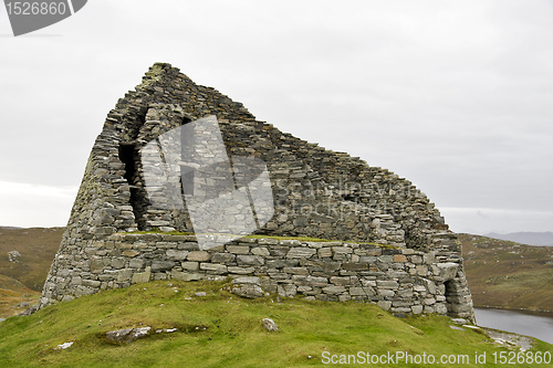 Image of ancient stone housing in scotland