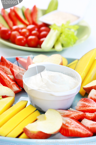 Image of Raw  fruits and vegetables with dip