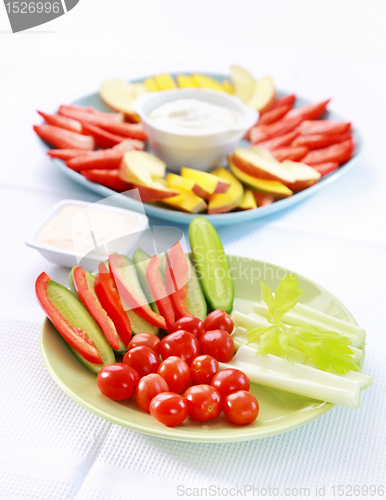 Image of Raw vegetable and fruits with dip