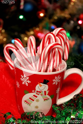 Image of Christmas cup with candy canes 
