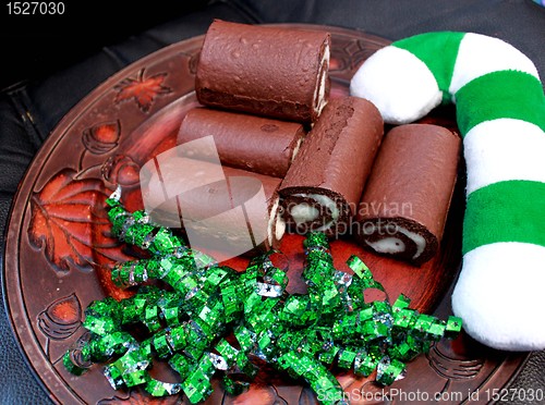 Image of Chocolate cake with Christmas cany cane