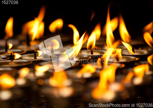 Image of Close up of Candles at Buddhist temple