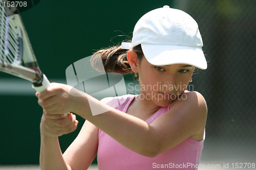 Image of Girl playing tennis