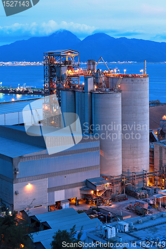 Image of cement factory at night