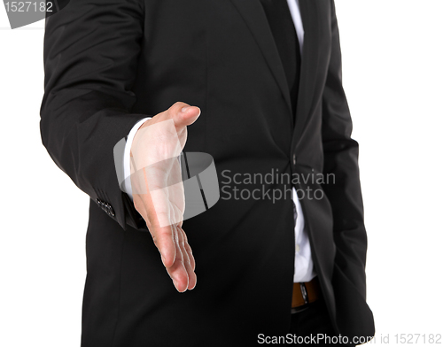 Image of business man extending hand to shake