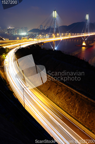 Image of highway and Ting Kau bridge at night