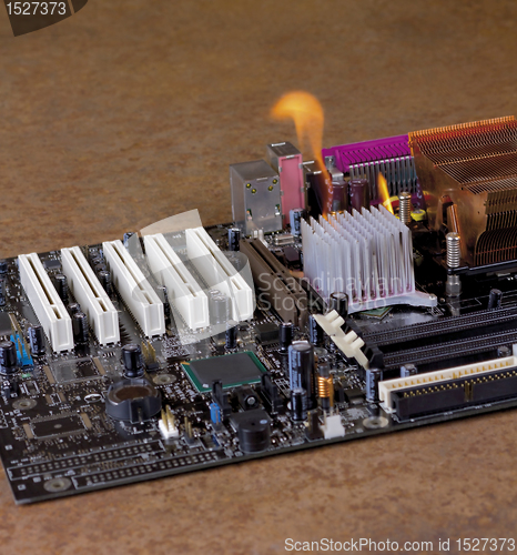 Image of burning motherboard