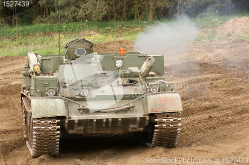 Image of offroad scenery with driving tank