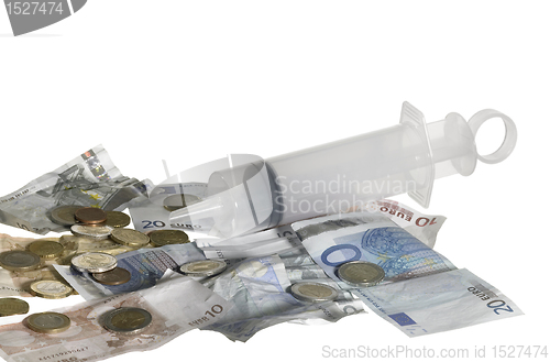 Image of syringe filled with money