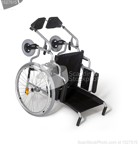 Image of toppled down wheelchair