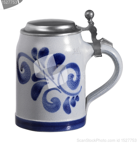 Image of stein with metallic cap