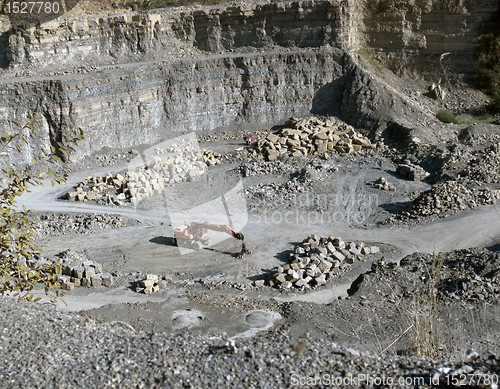 Image of digger and quarry