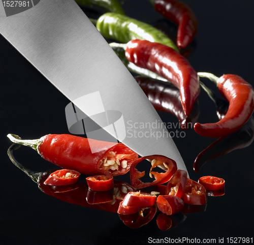 Image of chillies and kitchen knife