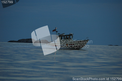 Image of Policeboat at night