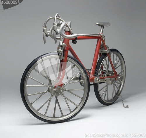 Image of model of a red framed bicycle