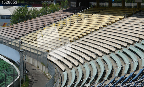 Image of racetrack tribune in sunny ambiance