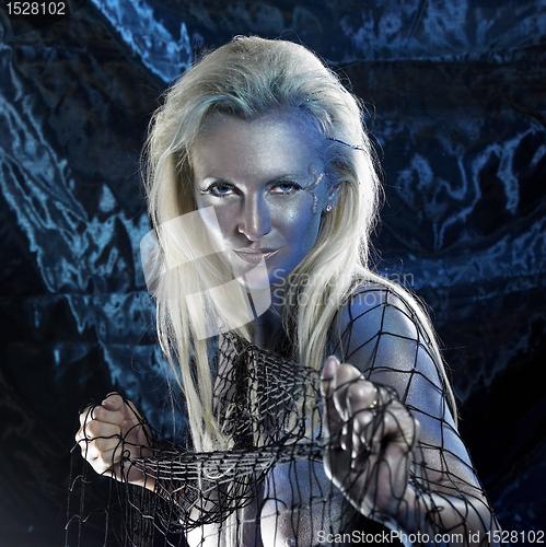 Image of blue bodypainted woman