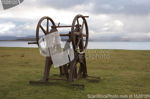Image of rusty old winch seaside in Scotland