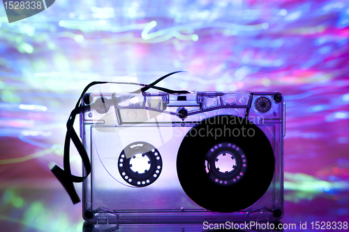 Image of Cassette tape and multicolored lights