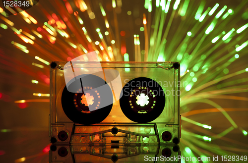 Image of Cassette tape and multicolored lights