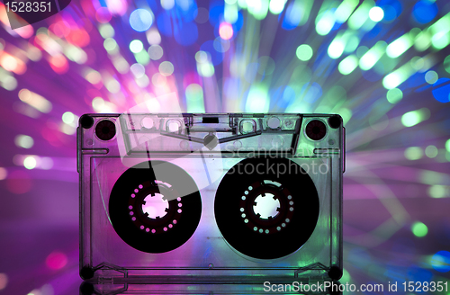 Image of Cassette tape and multicolored lights