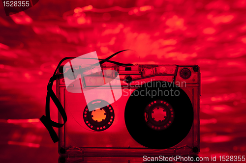 Image of Cassette tape and multicolored lights