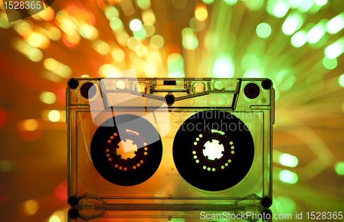 Image of Cassette tape and multicolored lights