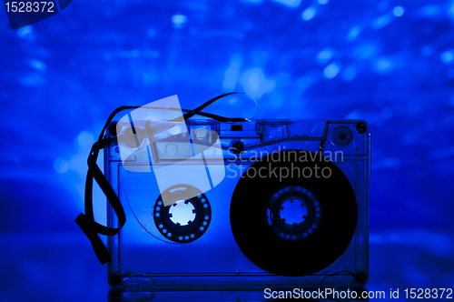 Image of Cassette tape and multicolored lights